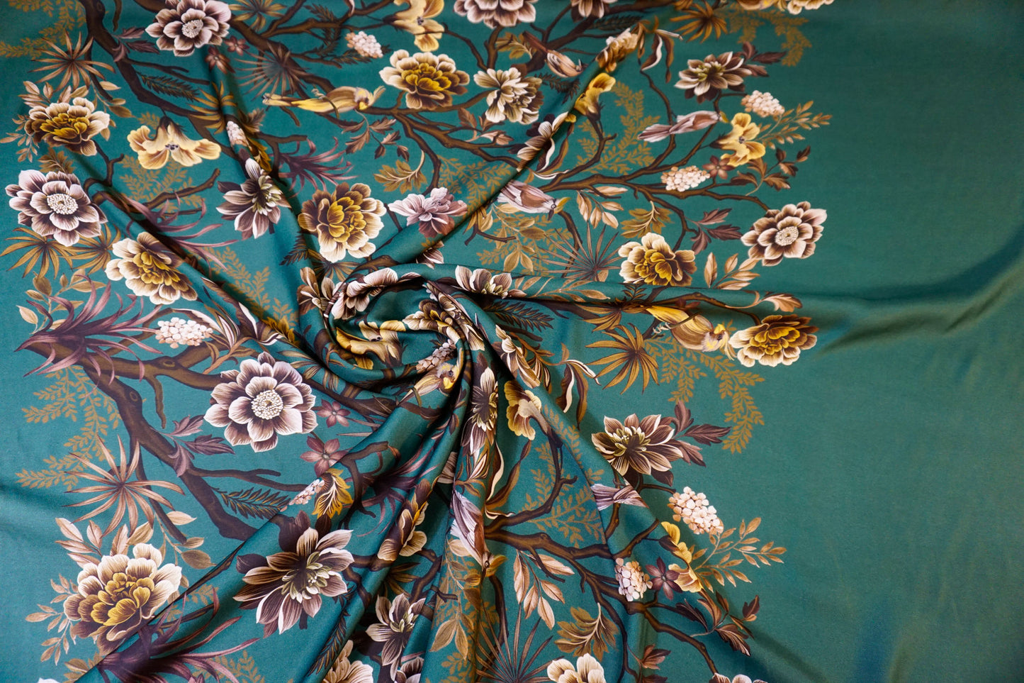 Exclusive viscose with border print – elegance meets nature