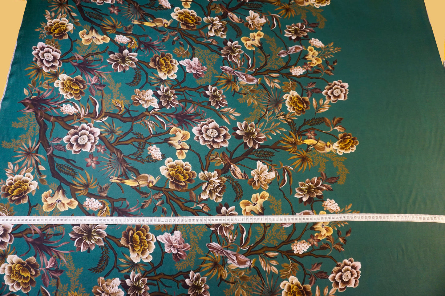 Exclusive viscose with border print – elegance meets nature