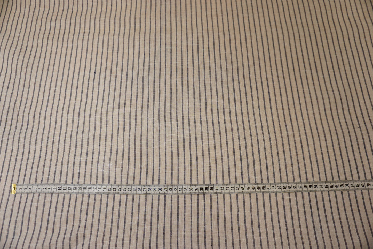 Fine linen fabric in white with denim blue stripes