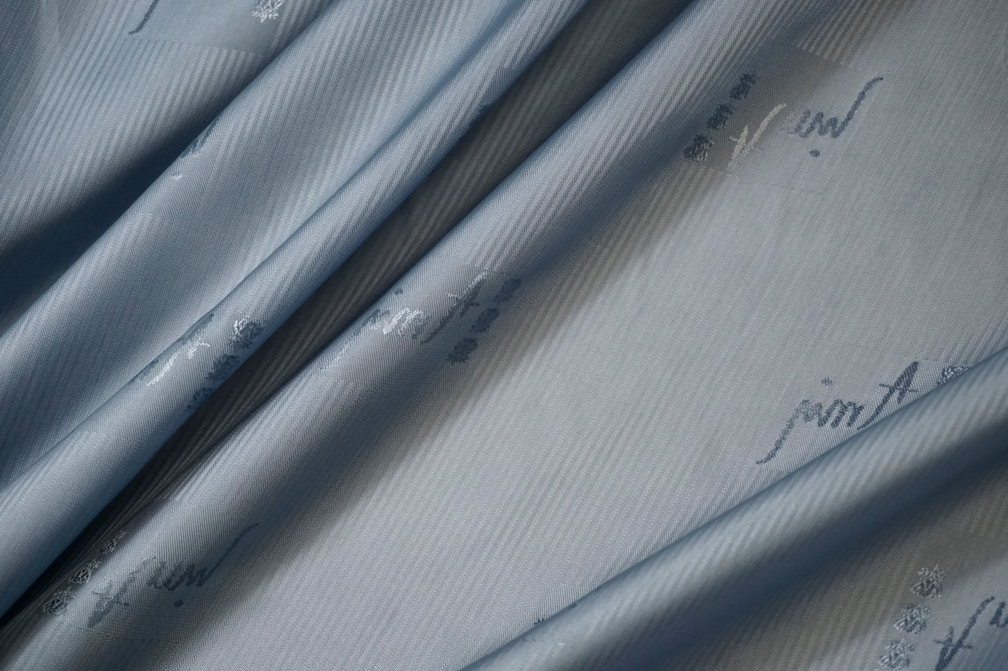Lining fabric with subtle lettering