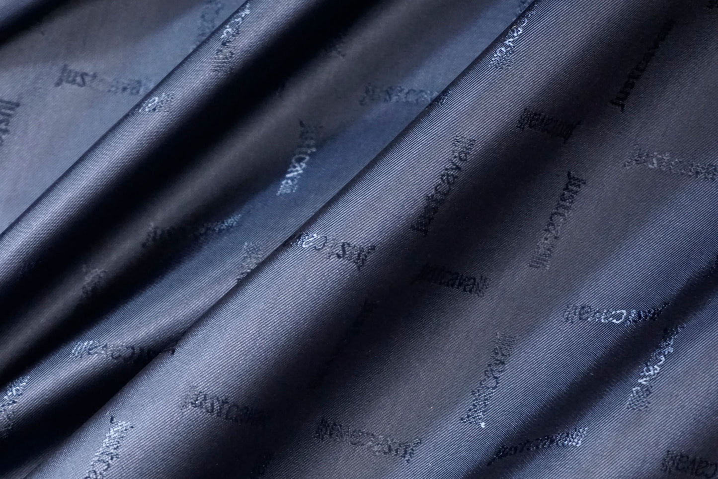 Viscose lining in dark blue with lettering