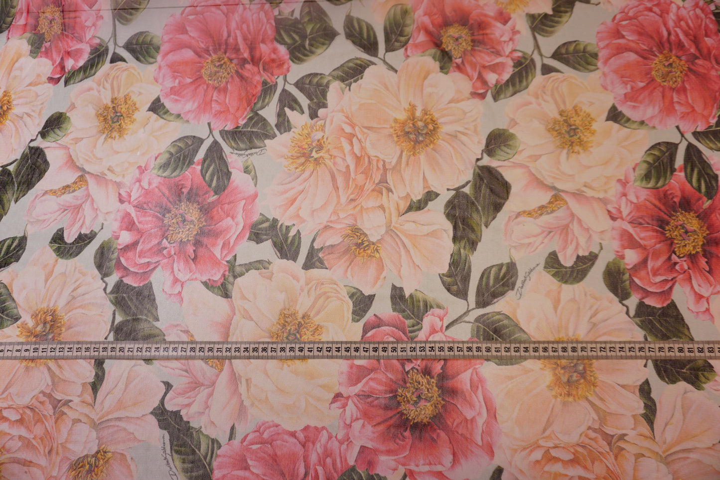 Delicate cotton tulle with roses – romantic lightness
