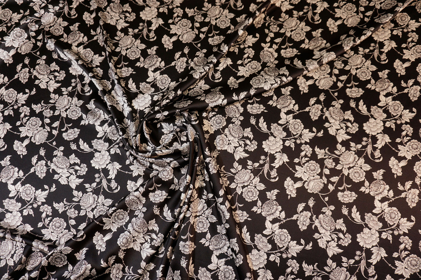 Silk stretch with floral sketches on black