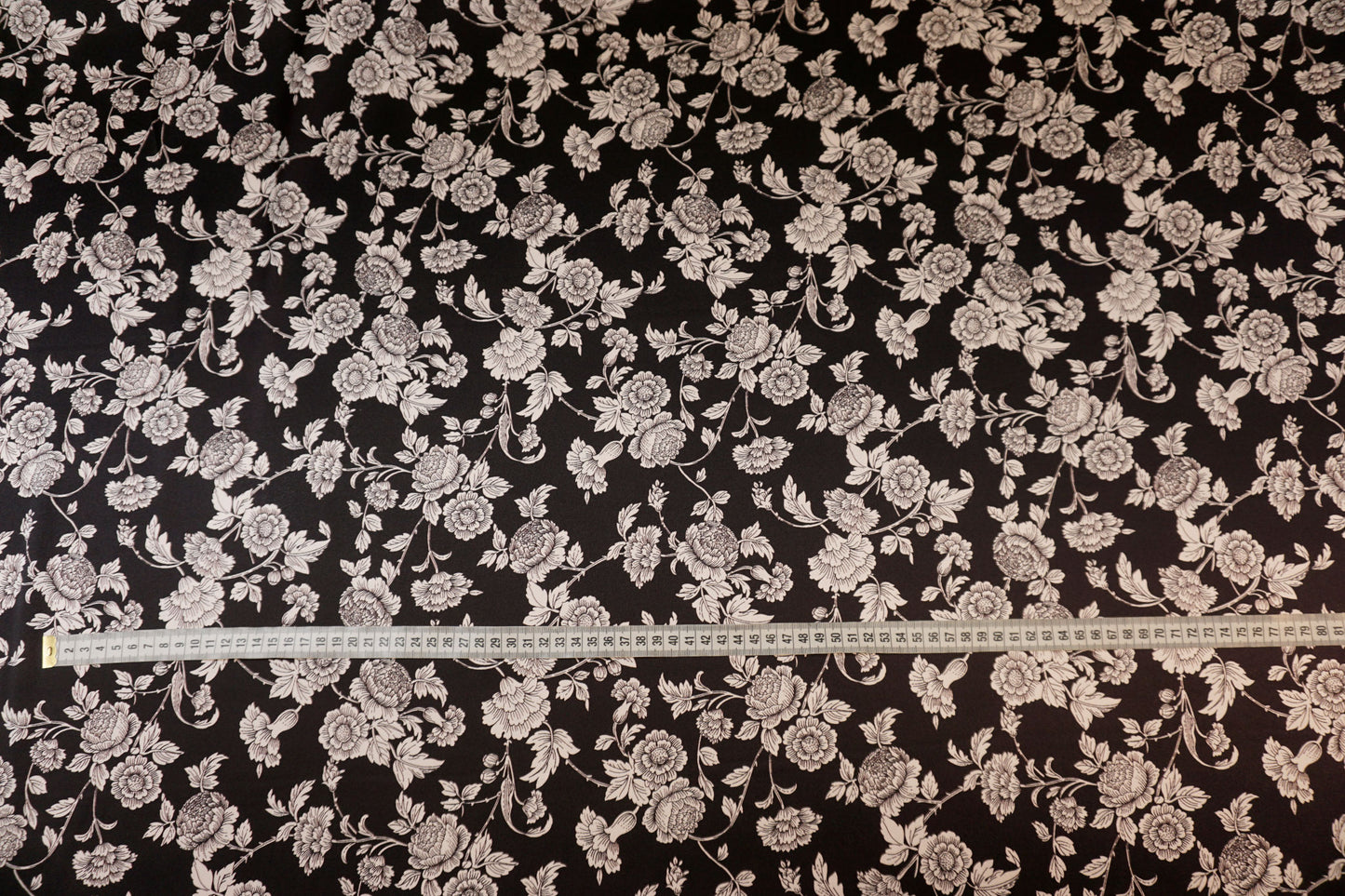 Silk stretch with floral sketches on black