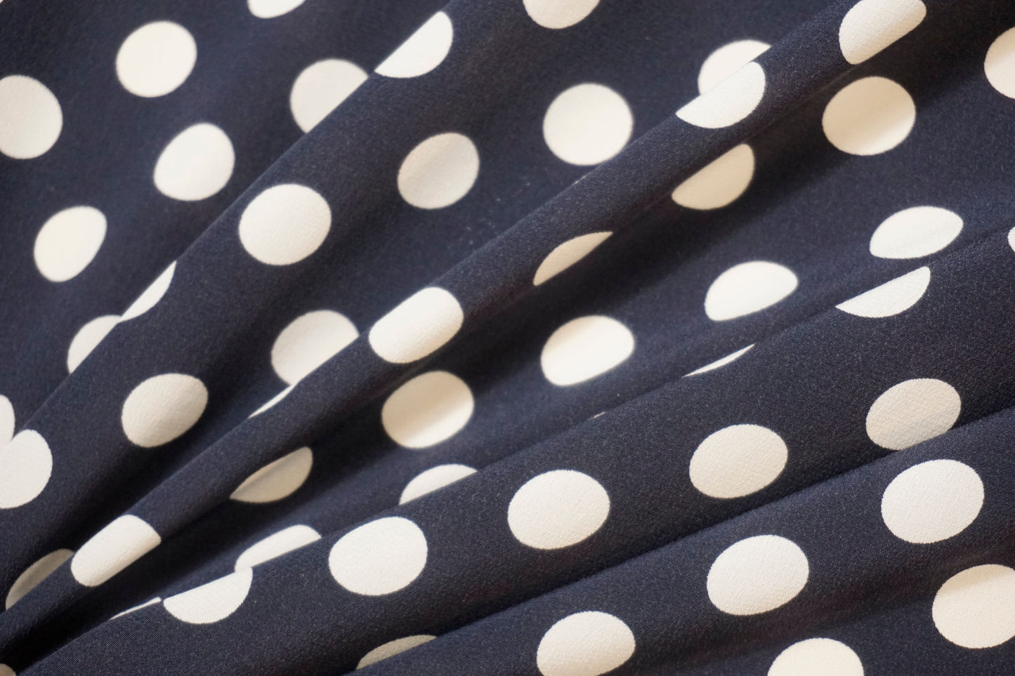 Elegant Italian silk crepe – dark blue with white polka dots