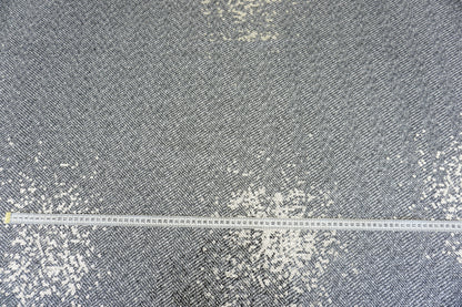 Exklusiver Chevron-Mantelstoff – Fischgrät-Optik mit Pailletten-Glow