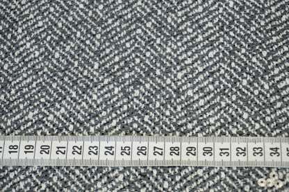 Exklusiver Chevron-Mantelstoff – Fischgrät-Optik mit Pailletten-Glow