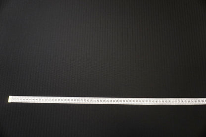 Webkante mit Schriftzug „Luxury Pure New Wool Made in Huddersfield England by Dugdale Bros"
