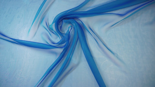 Delicate silk chiffon – like the shimmering sea