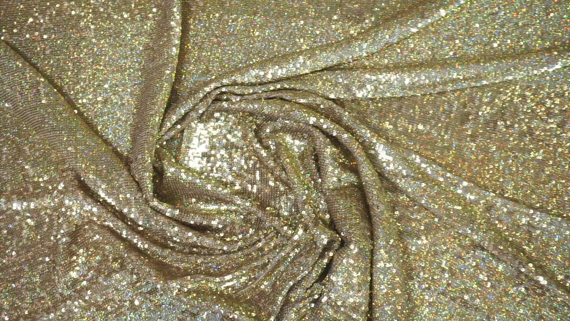 Goldener Paillettenstoff mit holografischem Multicolor-Schimmer, intensives Funkeln bei Bewegung